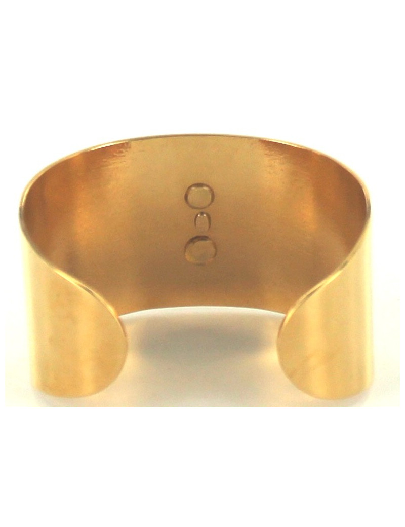 Manchette CHANEL en métal doré siglée CC