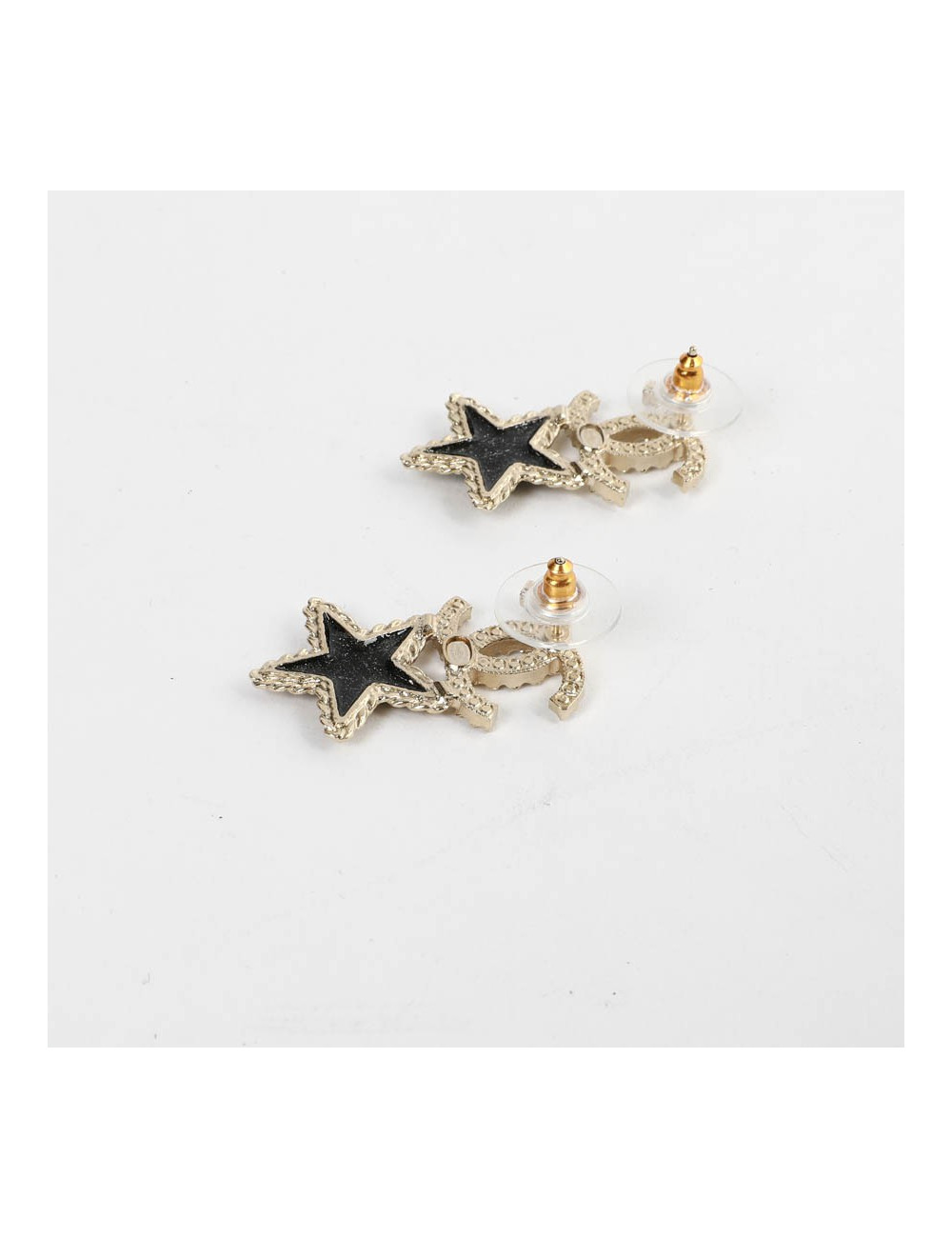 CHANEL clous d'oreille étoiles