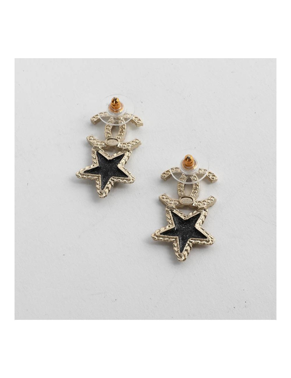 CHANEL clous d'oreille étoiles