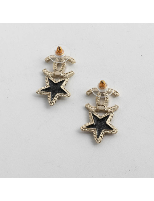 CHANEL clous d'oreille étoiles
