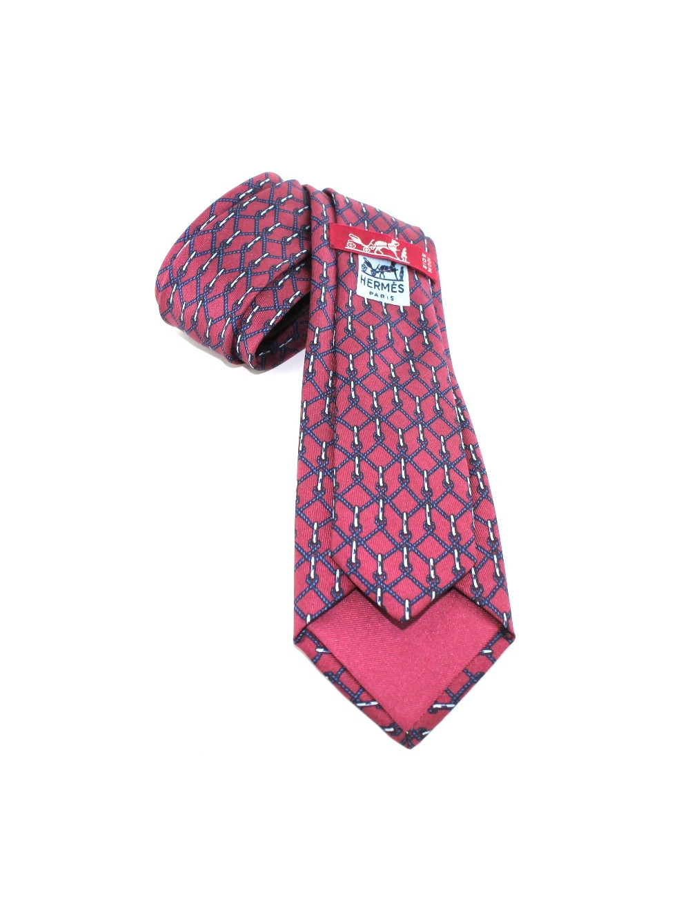 Cravate HERMES en soie rose et bleue barbelé 