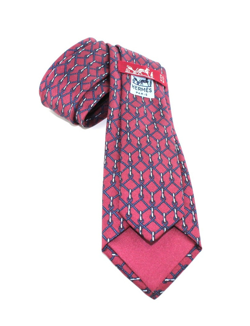 Cravate HERMES en soie rose et bleue barbelé 