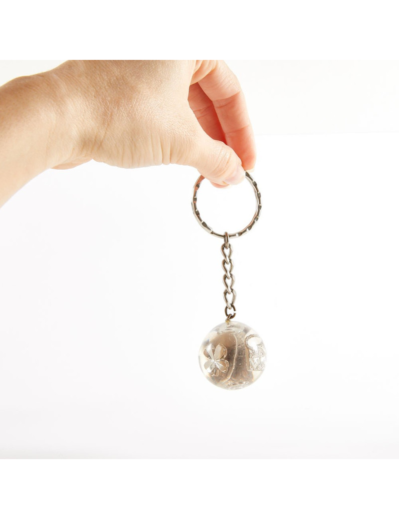 Porte-clefs CHANEL inclusion de charms