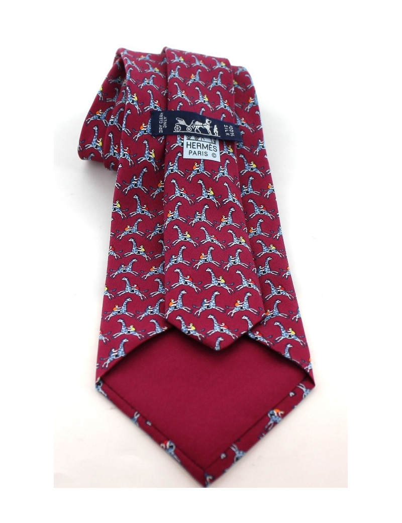 Cravate HERMES en soie bordeaux imprimé chevaux