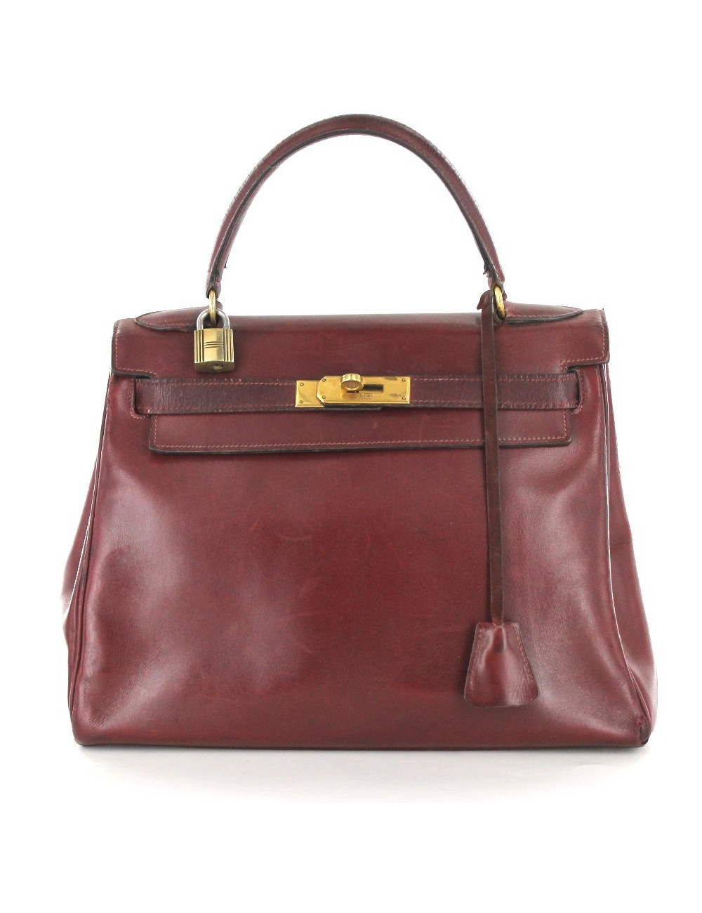 KELLY 28 HERMES vintage en cuir bordeaux bijouterie dorée