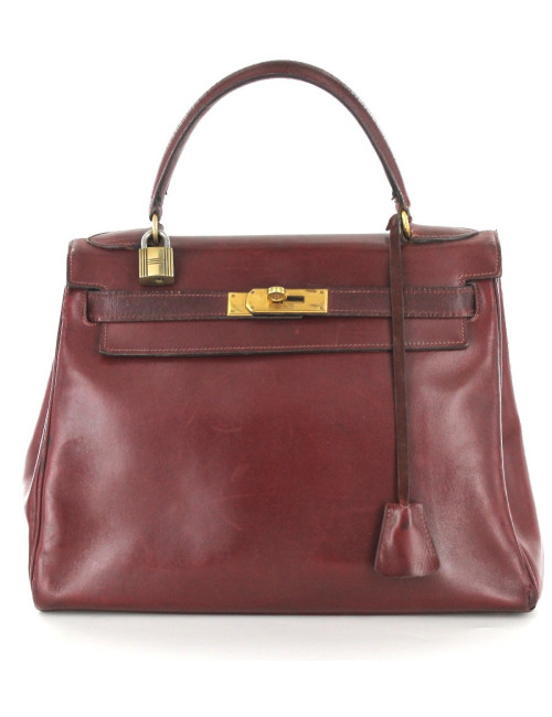 KELLY 28 HERMES vintage en cuir bordeaux bijouterie dorée
