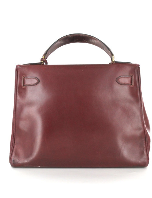 KELLY 28 HERMES vintage en cuir bordeaux bijouterie dorée