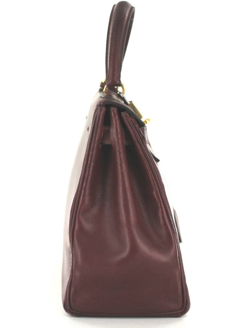 KELLY 28 HERMES vintage en cuir bordeaux bijouterie dorée