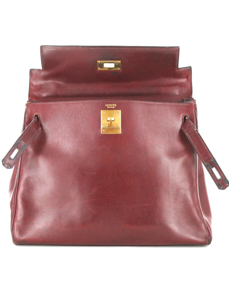 KELLY 28 HERMES vintage en cuir bordeaux bijouterie dorée