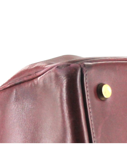 KELLY 28 HERMES vintage en cuir bordeaux bijouterie dorée