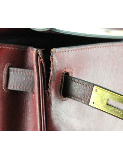 KELLY 28 HERMES vintage en cuir bordeaux bijouterie dorée