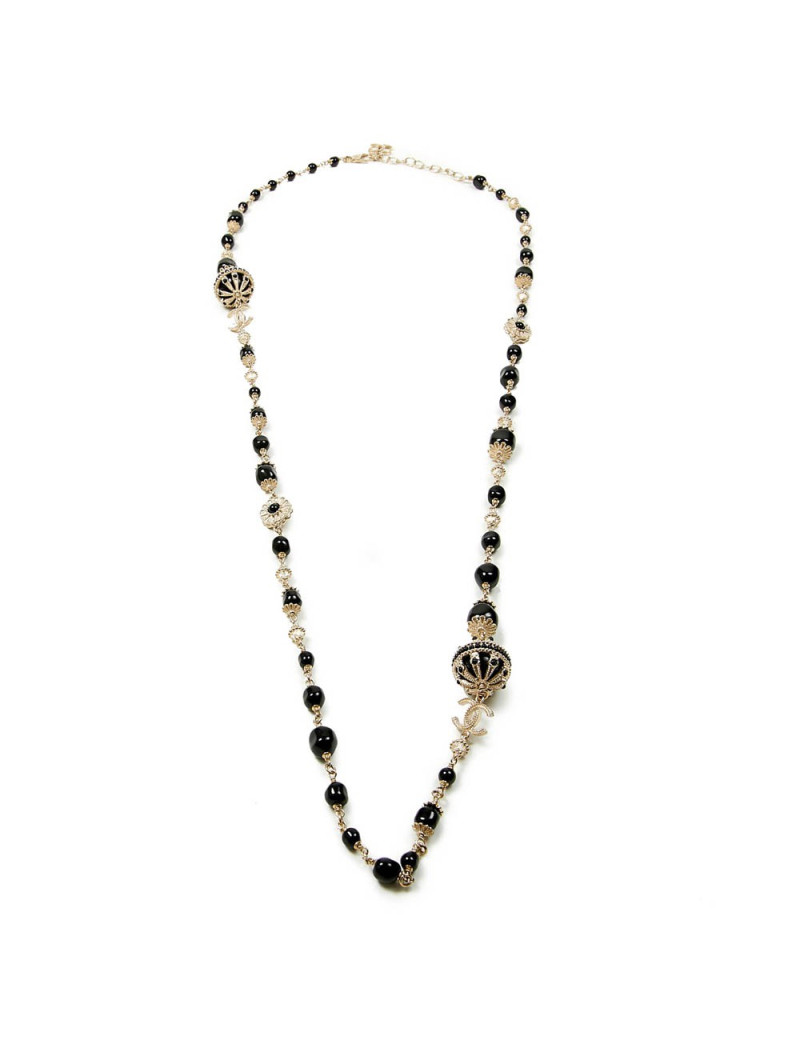 Sautoir CHANEL chaîne dorée et perles noires