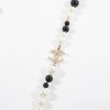 Sautoir CHANEL perles nacrées perles noires