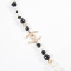 Sautoir CHANEL perles nacrées perles noires