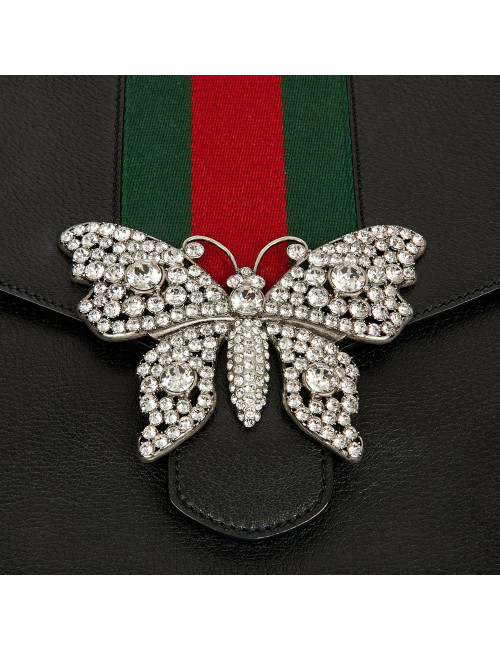 Serviette GUCCI cuir grainé et broche papillon