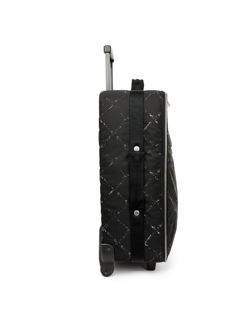  a reparer  roue Valise CHANEL en toile 