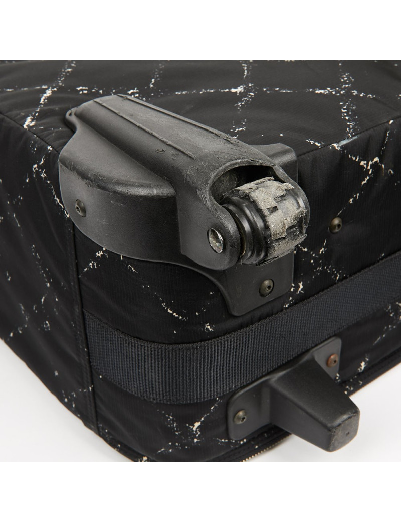  a reparer  roue Valise CHANEL en toile 