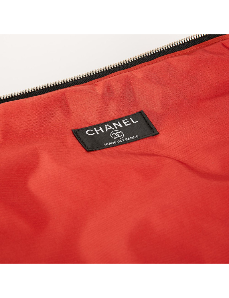  a reparer  roue Valise CHANEL en toile 