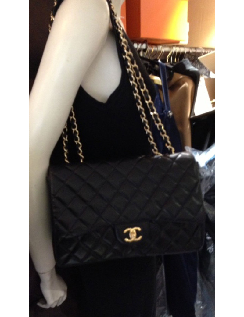 CHANEL jumbo black lambskin and golden chain bag