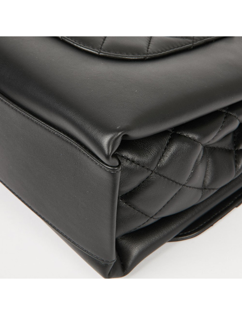 Sac à main CHANEL cuir lisse et matelassé noir