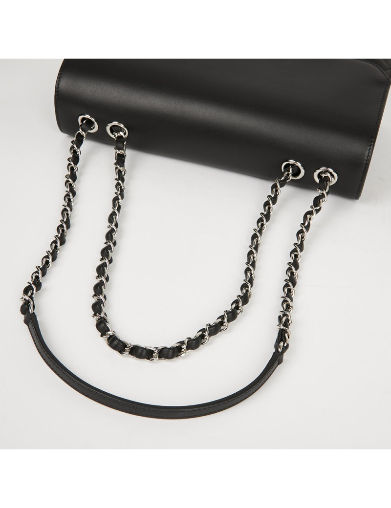 Sac à main CHANEL cuir lisse et matelassé noir