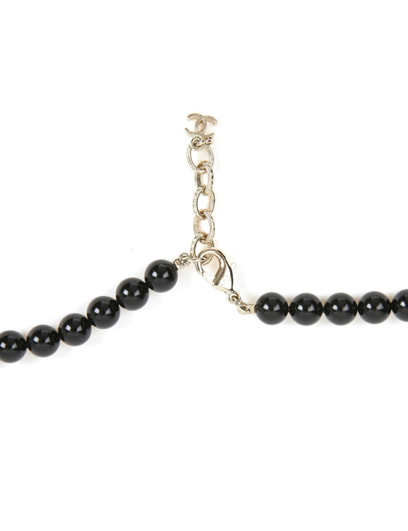Sautoir CHANEL perles noires