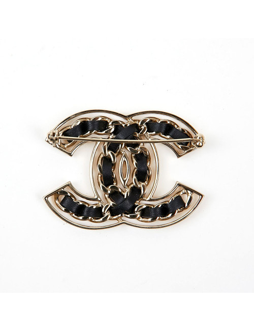 Broche CHANEL métal or entrelacée de cuir noir
