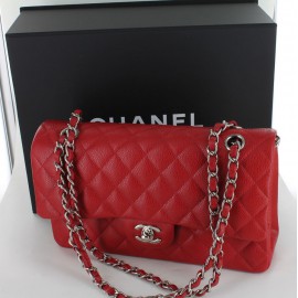Timeless CHANEL red caviar leather bag