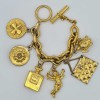 Bracelet charms vintage CHANEL doré