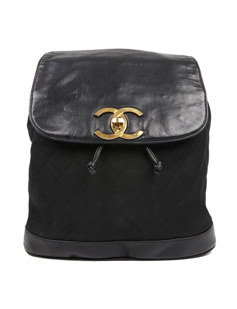 Sac a dos vintage CHANEL en toile et cuir bleu marine