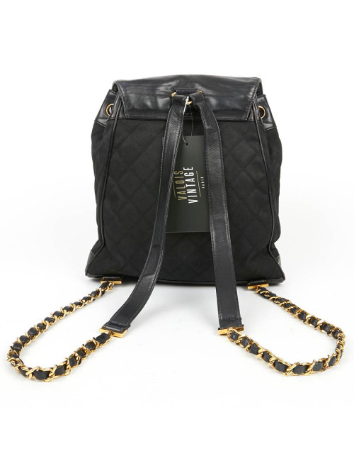 Sac a dos vintage CHANEL en toile et cuir bleu marine