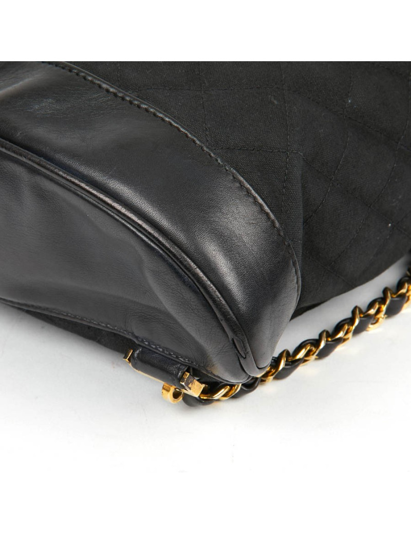 Sac a dos vintage CHANEL en toile et cuir bleu marine