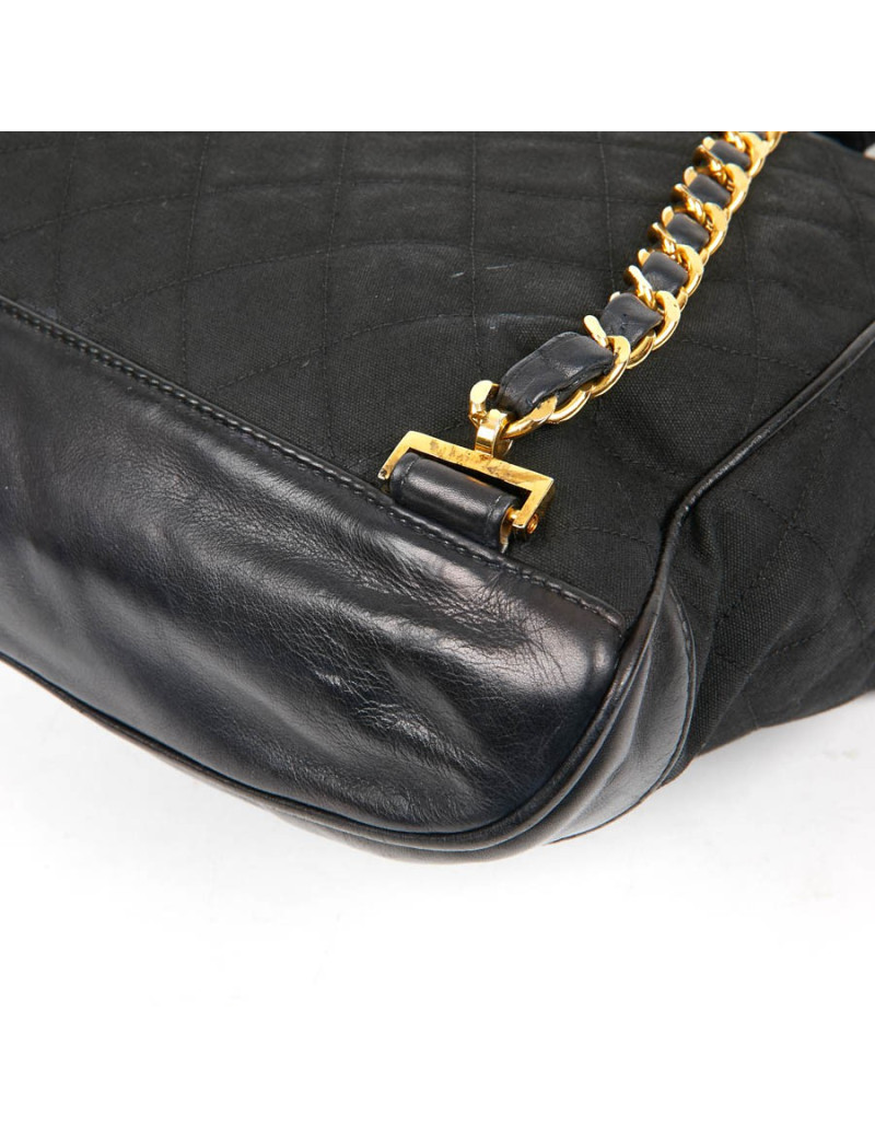 Sac a dos vintage CHANEL en toile et cuir bleu marine