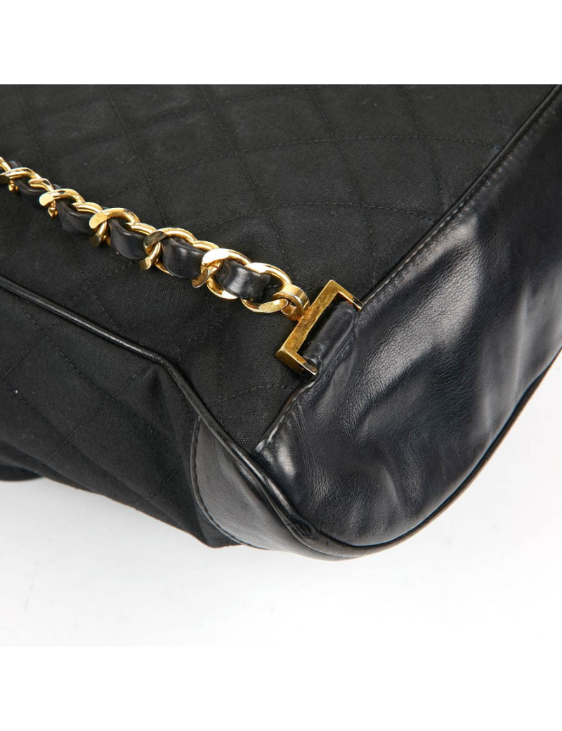 Sac a dos vintage CHANEL en toile et cuir bleu marine