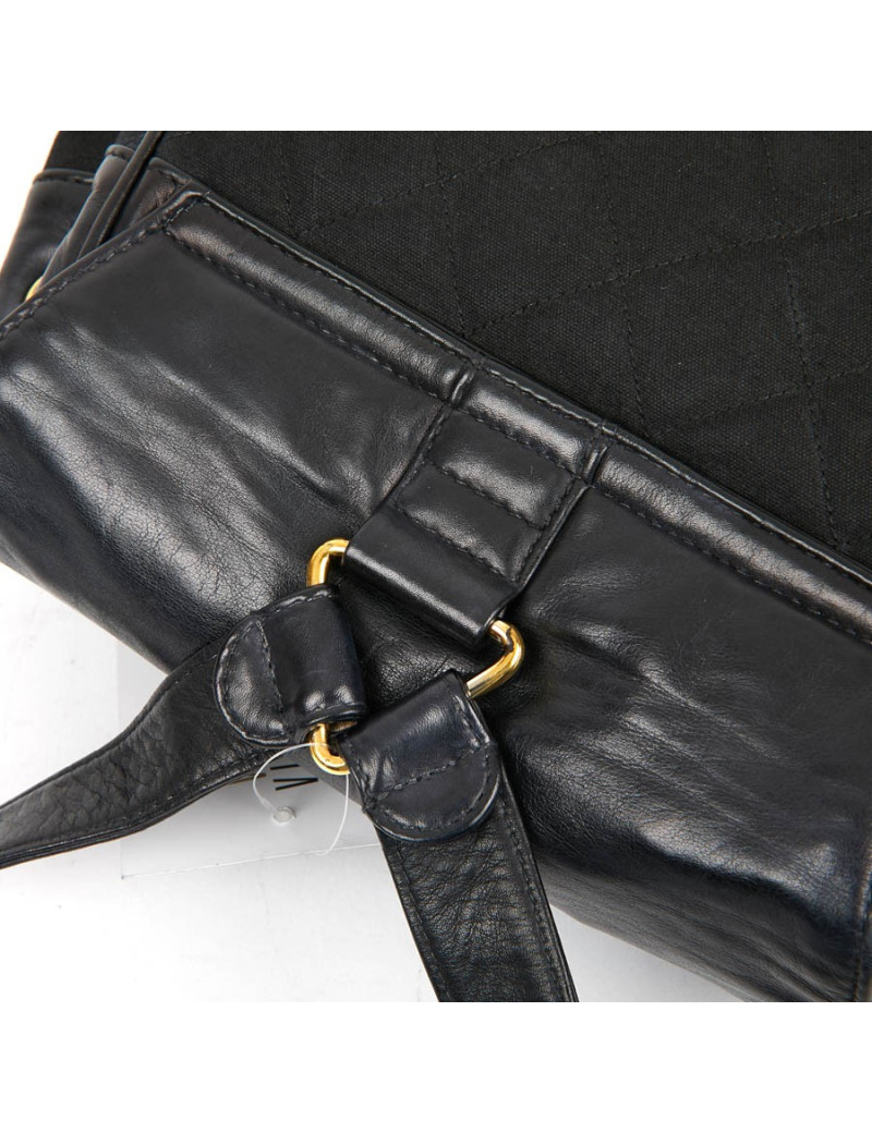 Sac a dos vintage CHANEL en toile et cuir bleu marine