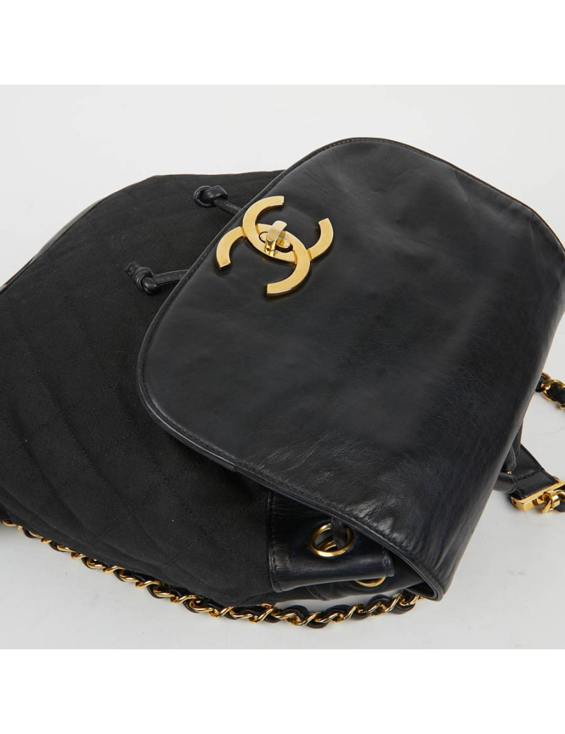 Sac a dos vintage CHANEL en toile et cuir bleu marine