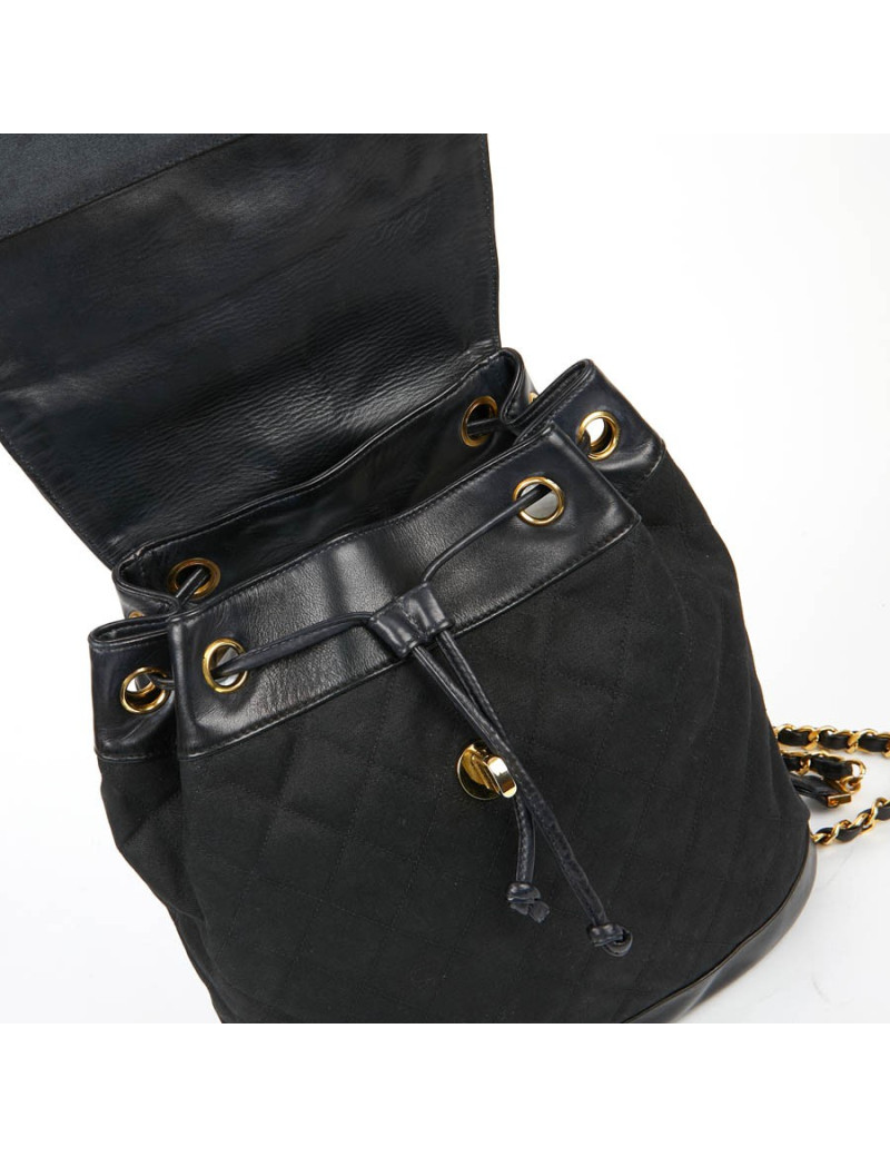 Sac a dos vintage CHANEL en toile et cuir bleu marine