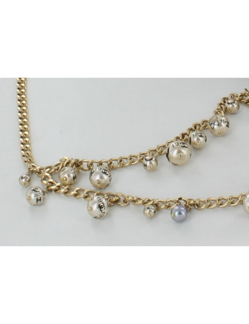 Ceinture/ sautoir CHANEL en métal doré orné de perles nacrées 