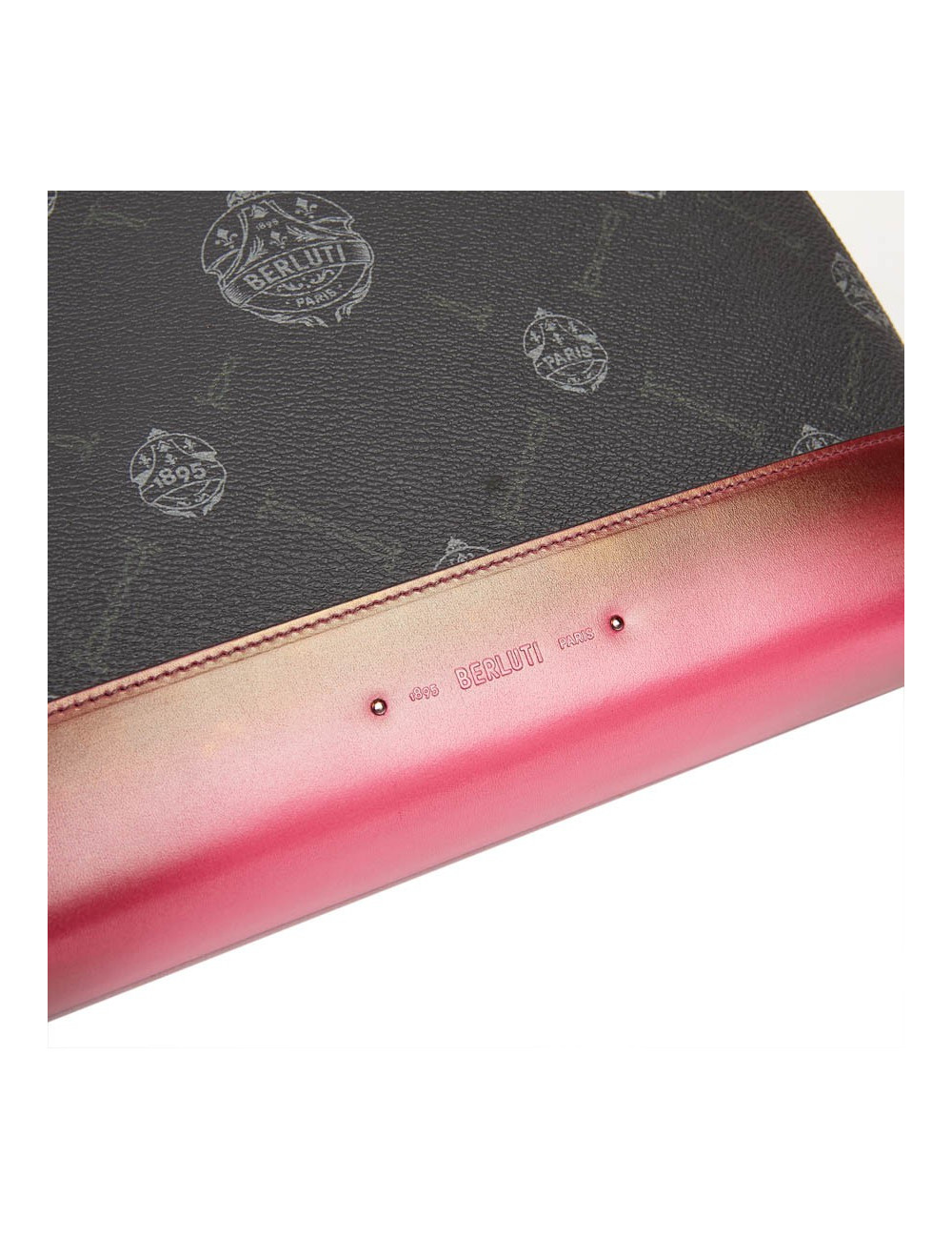 Pochette Nino BERLUTI en toile et cuir framboise