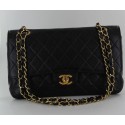 Timeless CHANEL bag in black grained leather