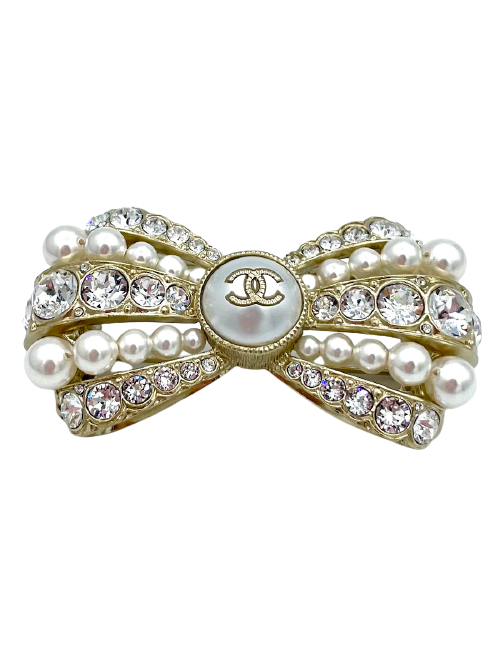 Broche CHANEL dorée perles et strass