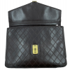 CHANEL Vintage Briefcase in brown quilted lamb leather.