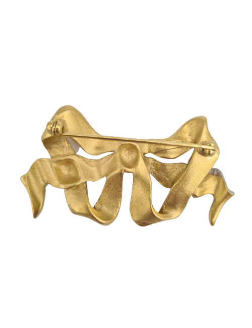 Broche NINA RICCI noeud doré