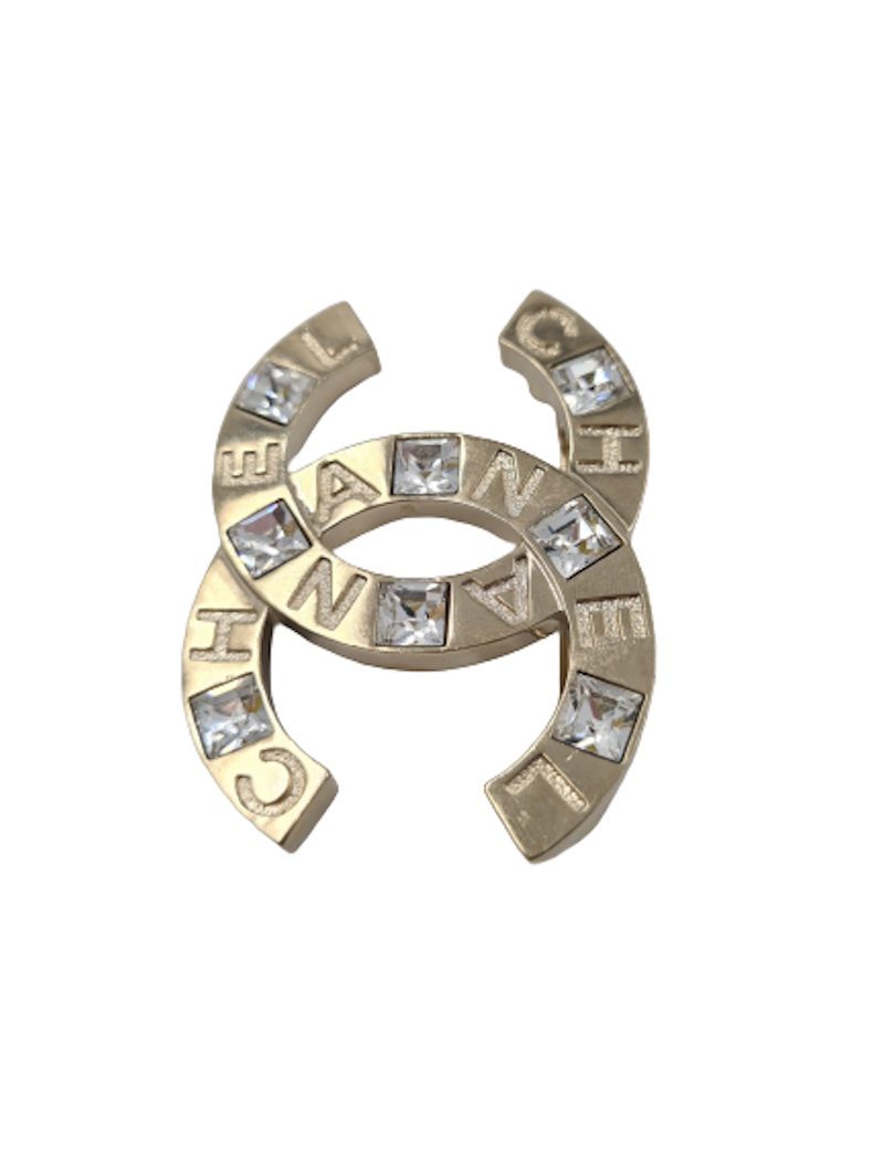 Broche CHANEL C H A N E L strass