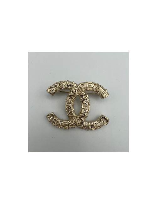 Broche CHANEL or pâle