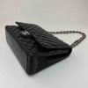 CHANEL Maxi Jumbo Handbag in Black Lamb Leather