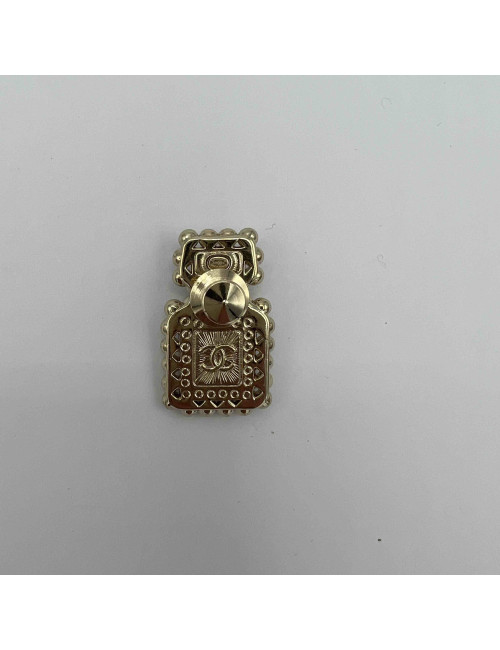 Pin's CHANEL bouteille nacrée