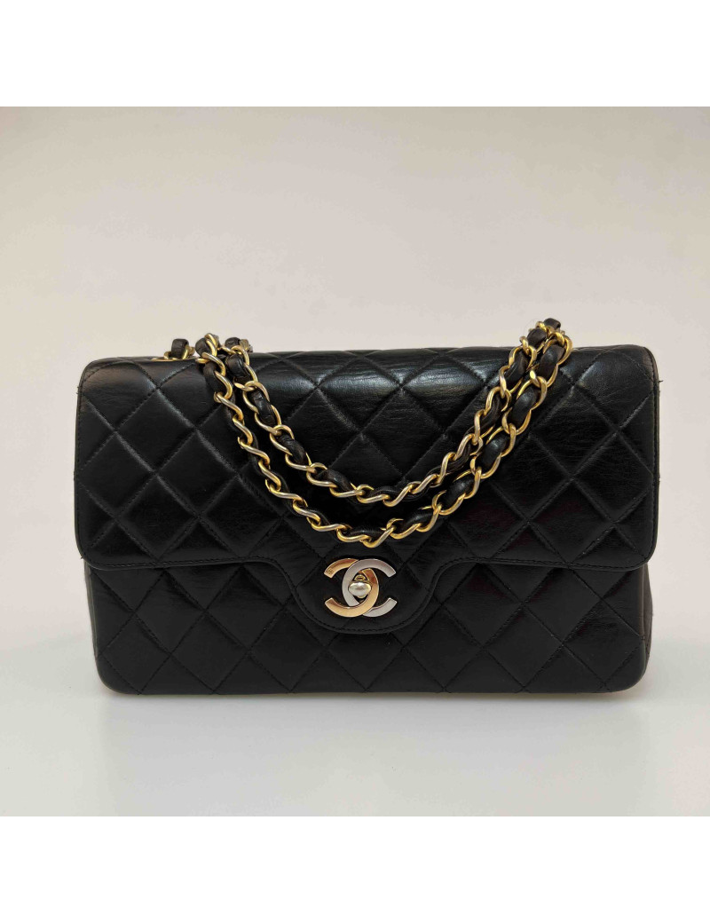 CHANEL Timeless Couture black quilted leather