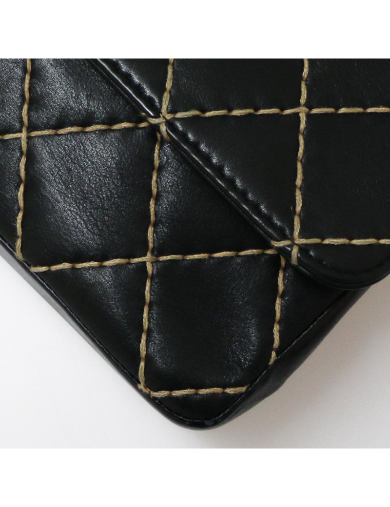 Sac CHANEL noir coutures beige