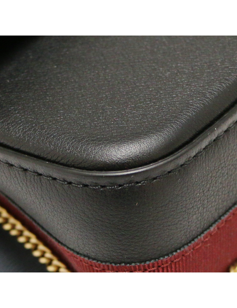 CHANEL black bag with burgundy trimming